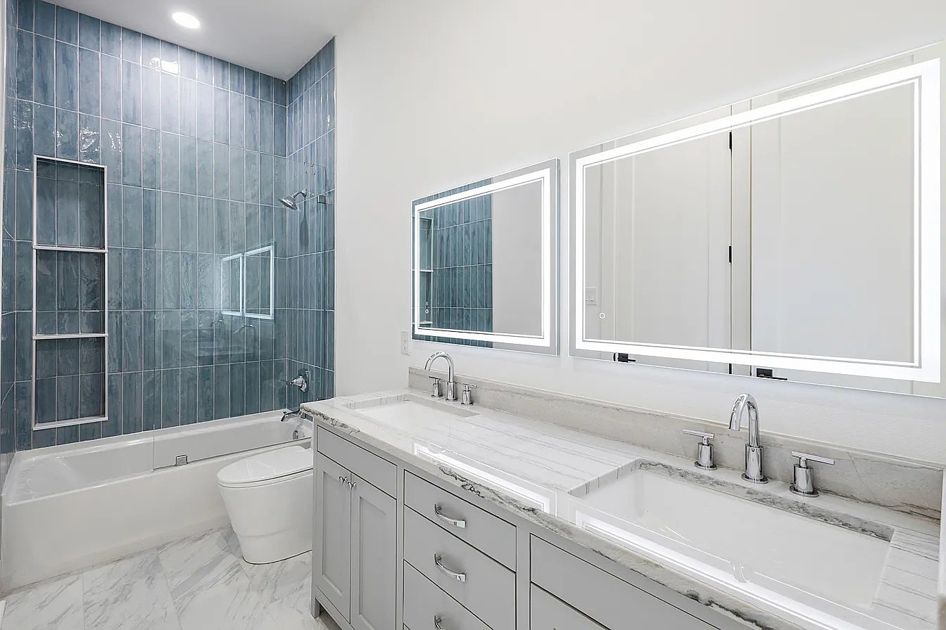 Blue tile double-vanity bath