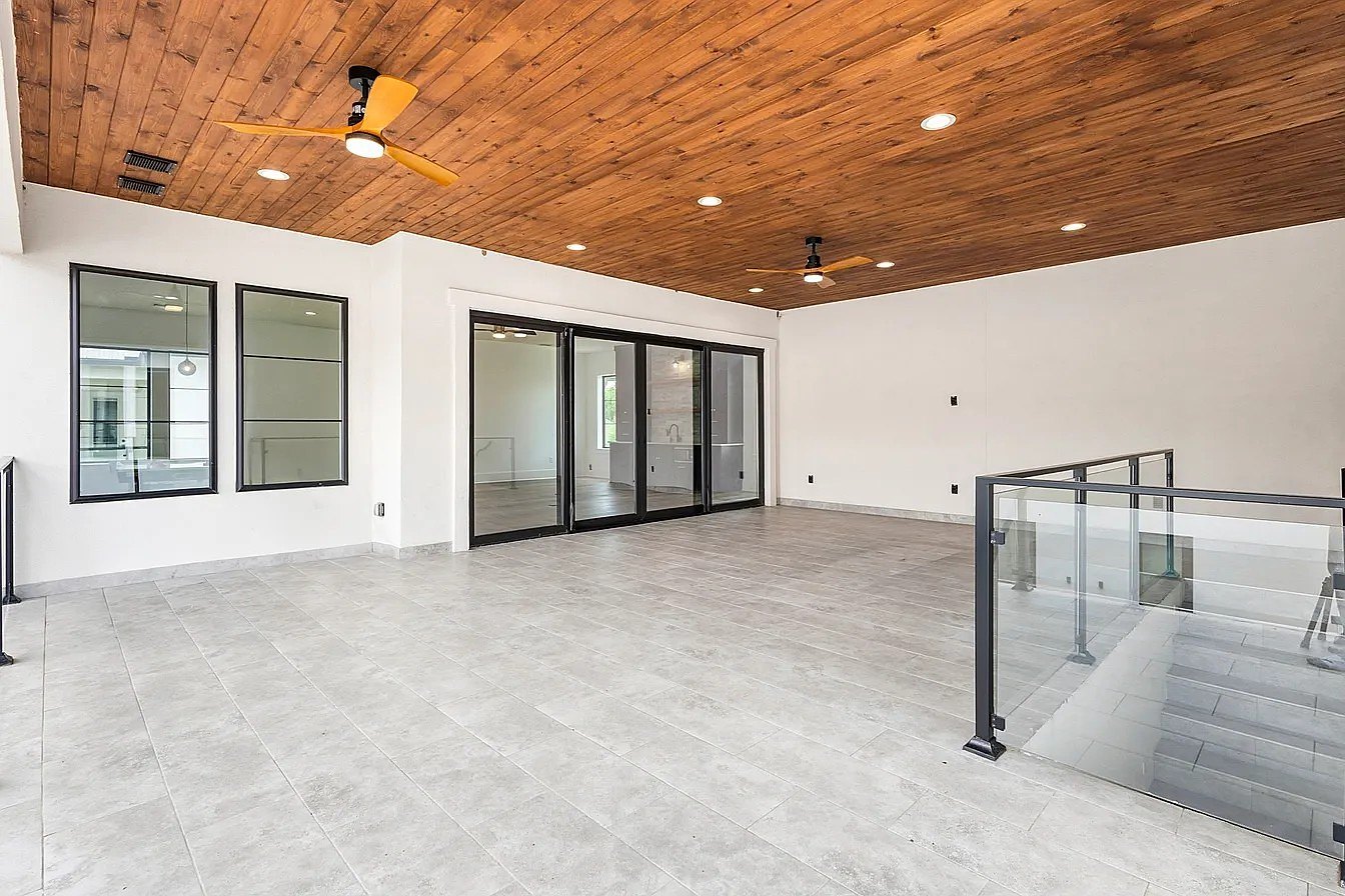 Covered terrace with wood ceiling